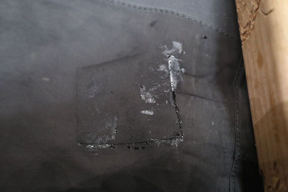 applying patch to breathable fishing waders