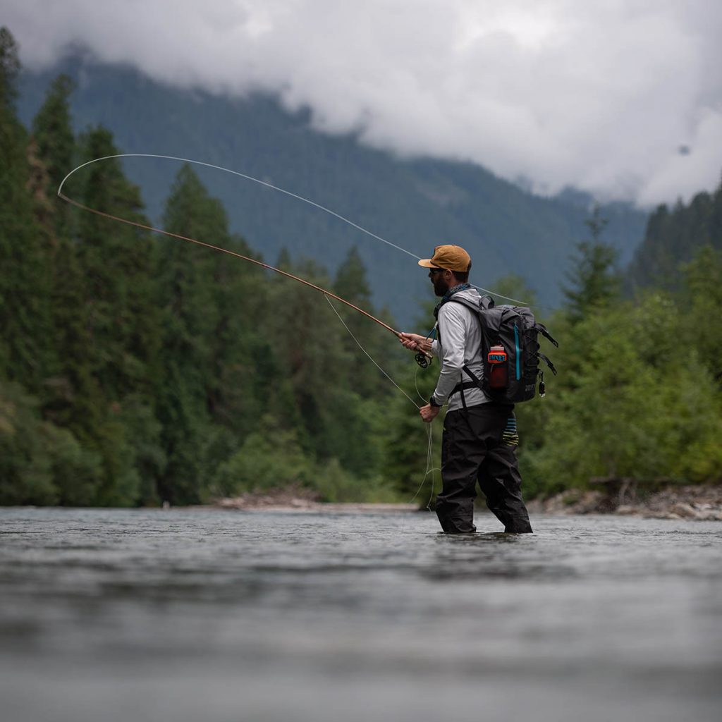 small river fishing in waist high waders